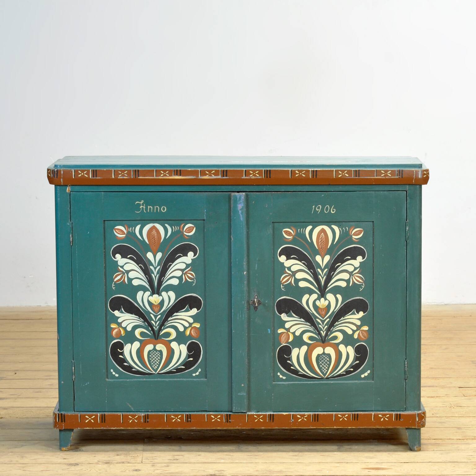 Original antique Swedish cabinet with blue-green folk style painting, dated 1906