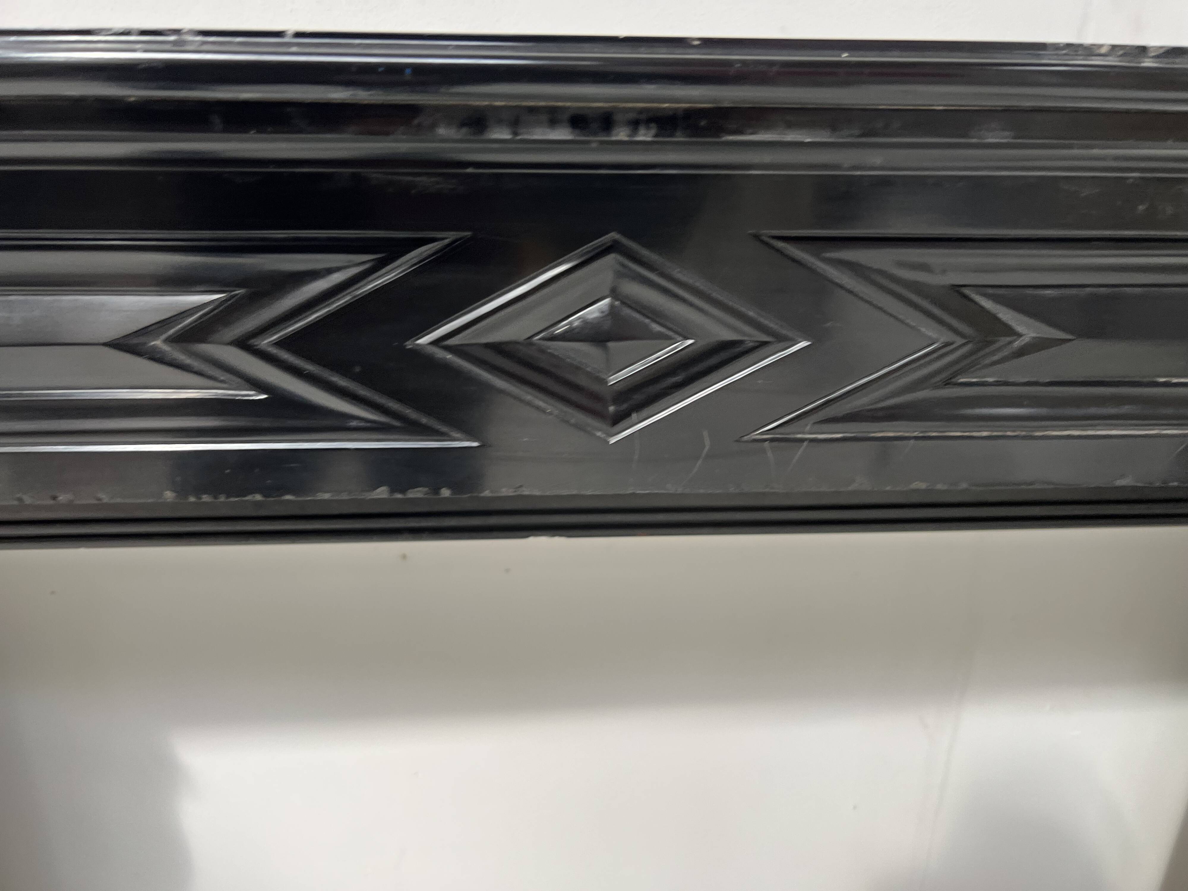 Napoleon III fireplace with claw feet in black marble, 19th century