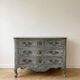 Louis XV commode in grey patina