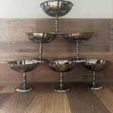 Vintage set of 6 finely engraved stainless steel bowls.