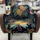 British style armchair in embroidered black velvet and legs in solid black mango tree