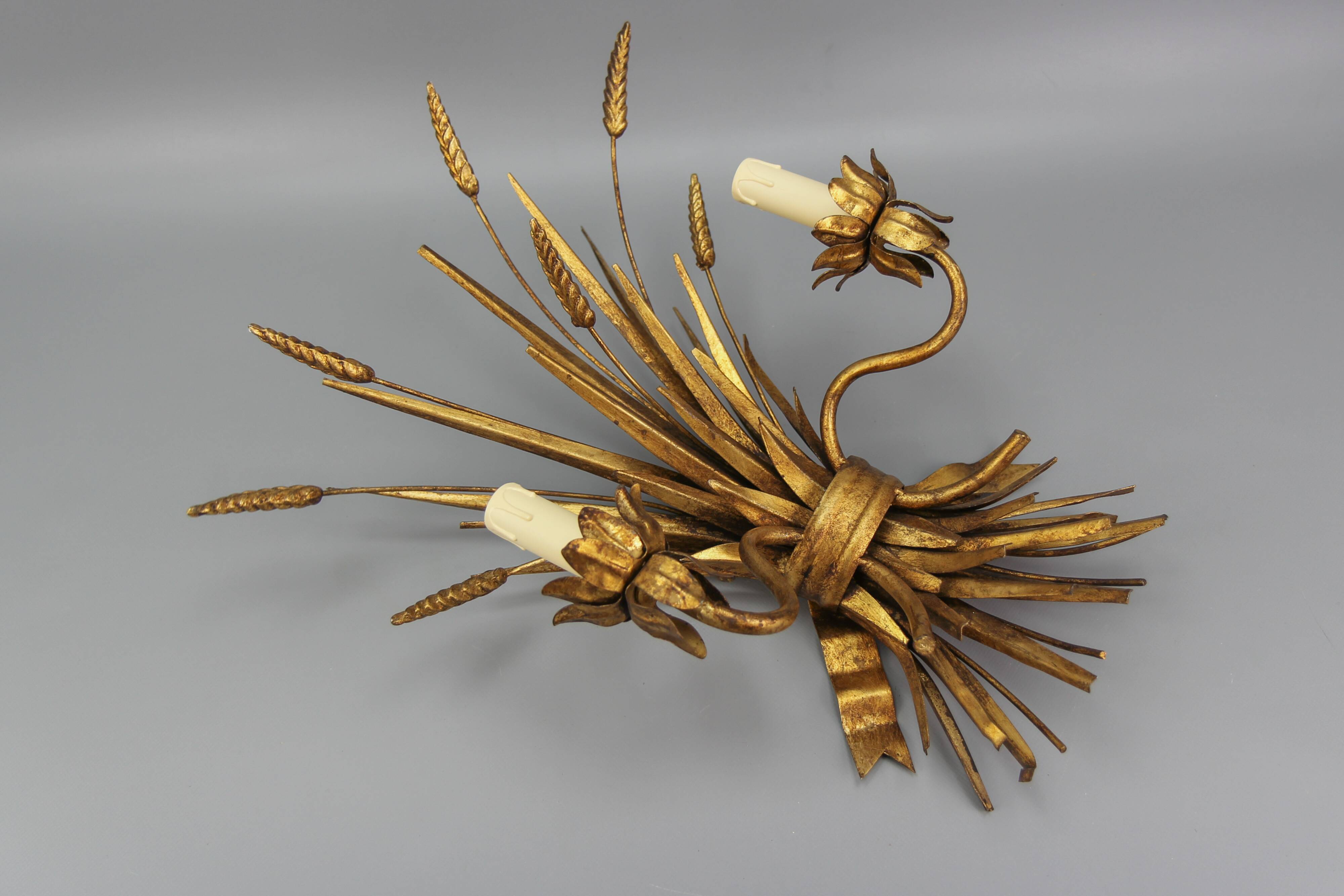 Gilt metal wheat sheaf two-light wall sconce