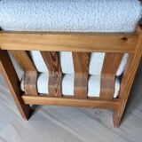 Vintage wooden armchair with curly seat