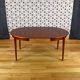 Scandinavian design round table in teak 1960