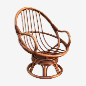 Swivel rattan armchair