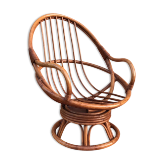 Swivel rattan armchair