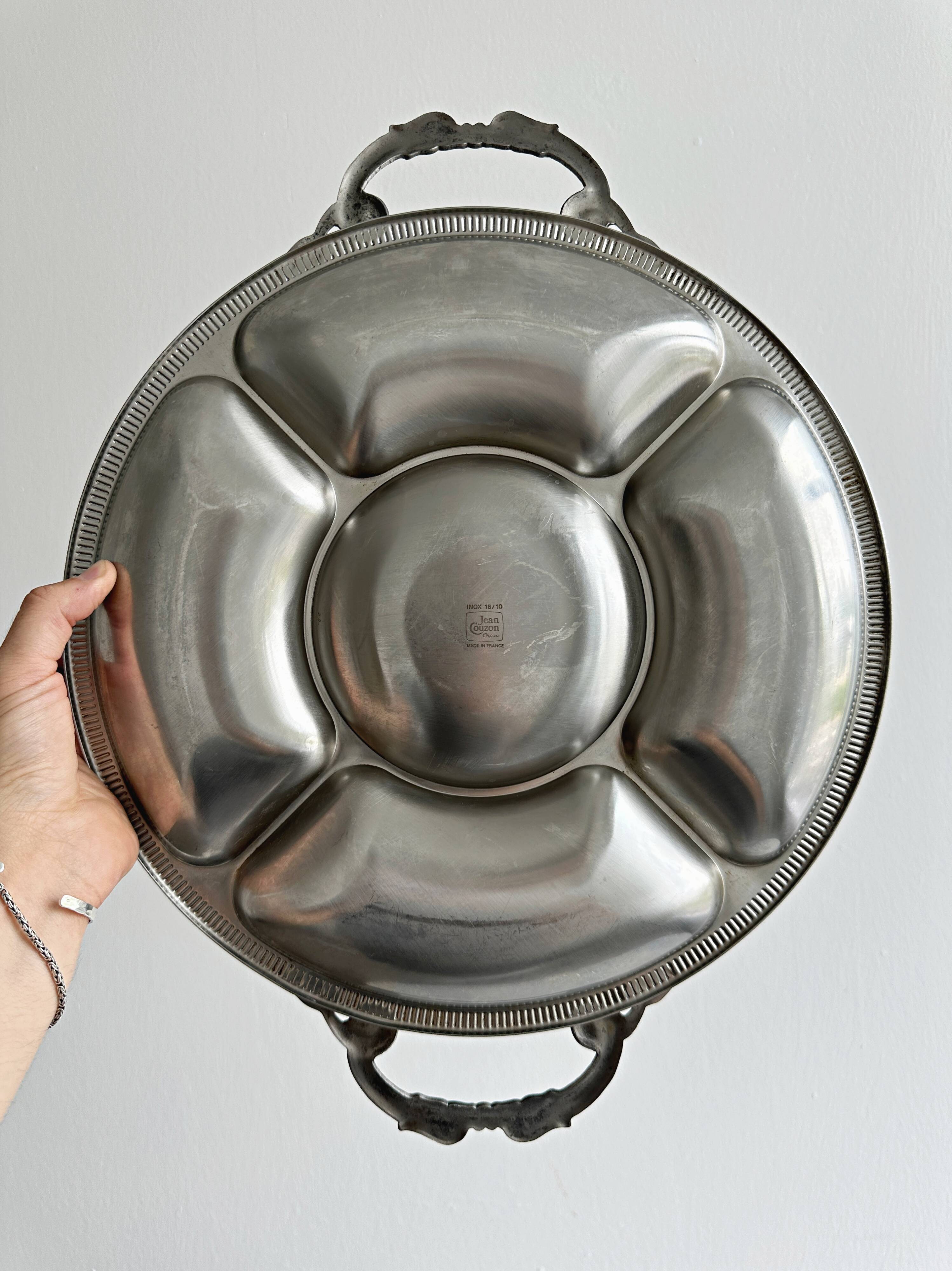 Vintage silver-plated metal serving tray with compartments.