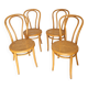 Four cane bistro chairs