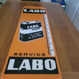 Tole émaillée publicitaire Huiles Labo Rush
