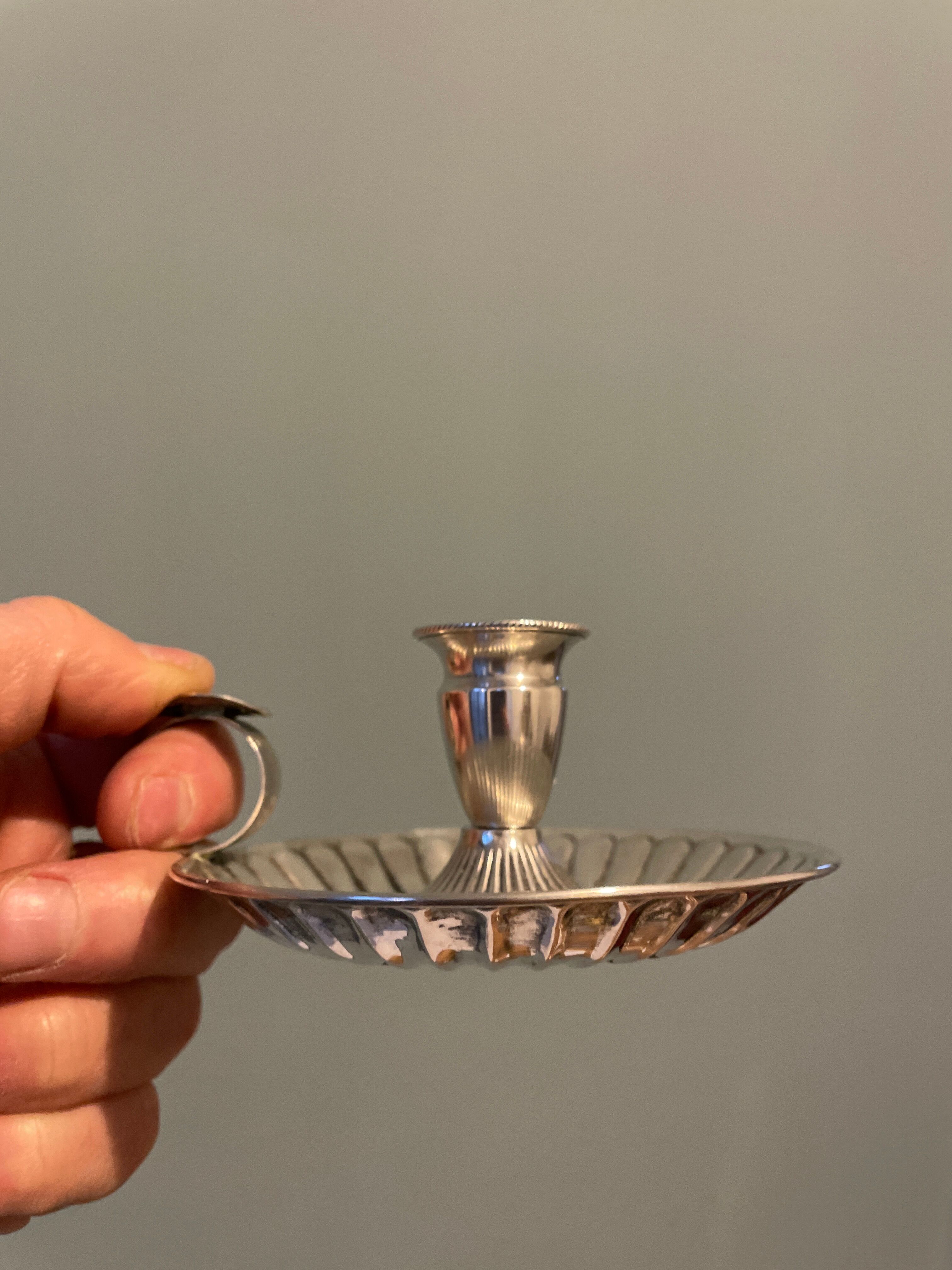 Solid silver hand candle holder