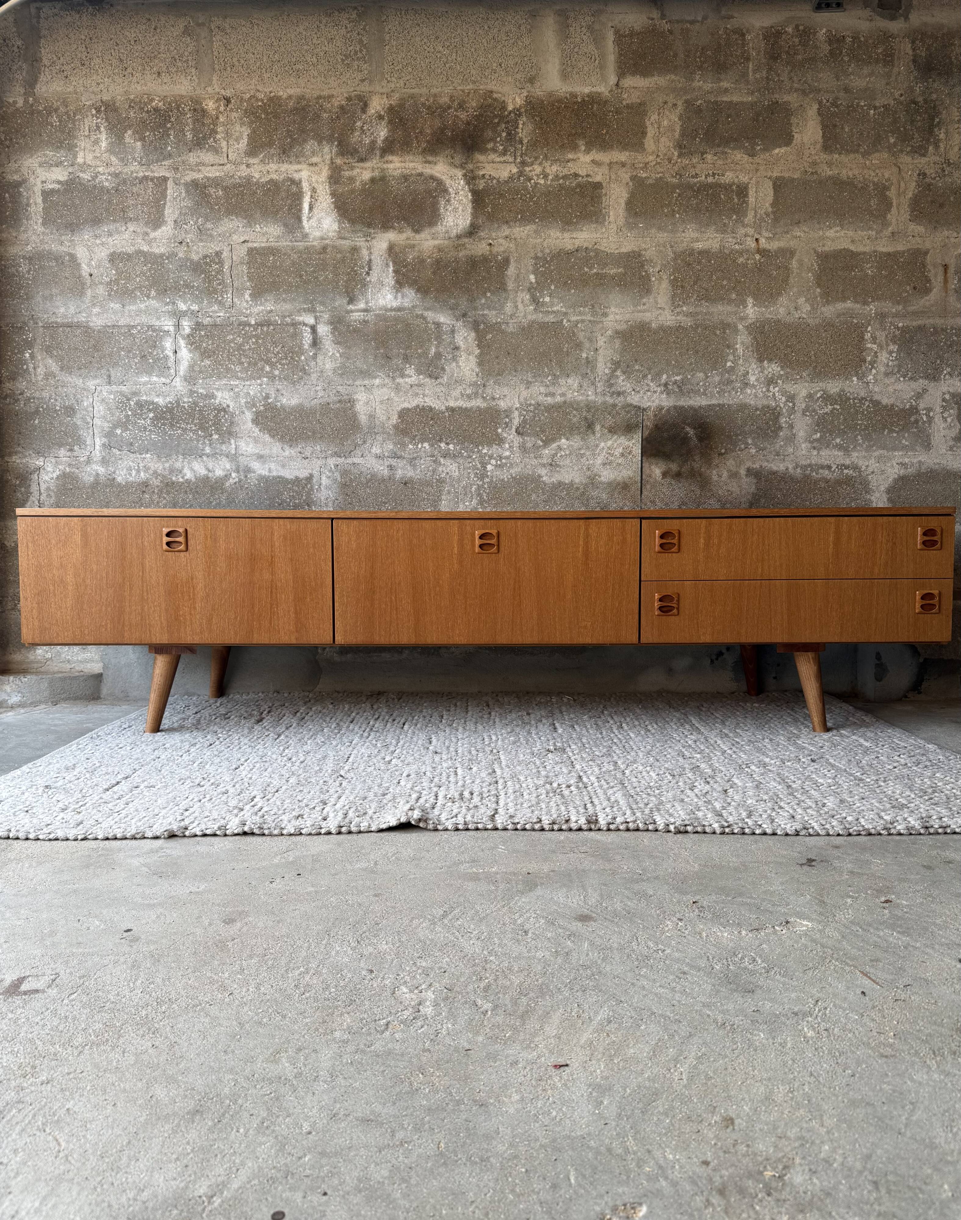 Scandinavian low sideboard in teak, 1970.