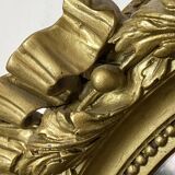 Miroir ancien ovale doré – style Louis XVI avec nœud ruban