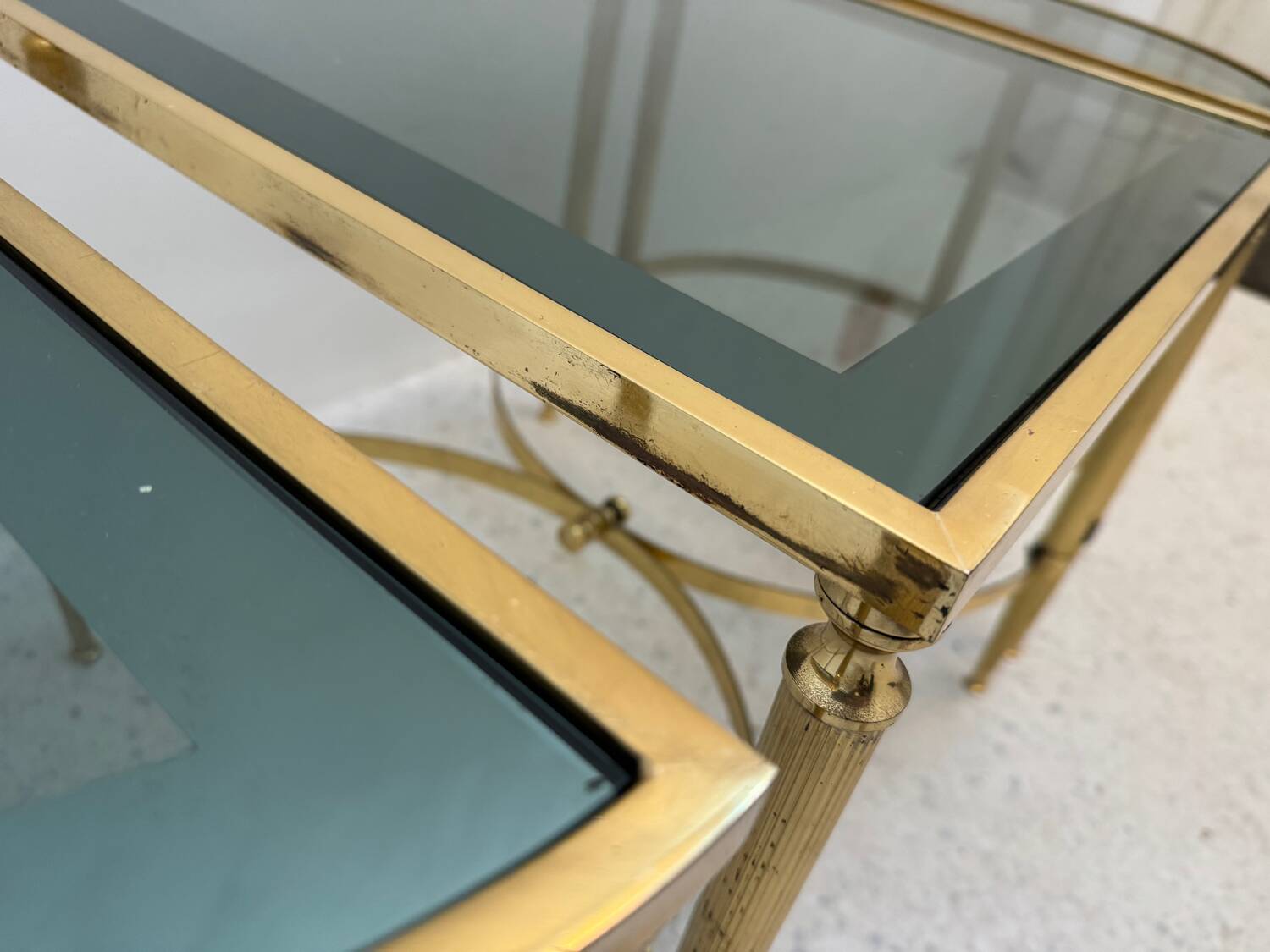 Neo classic coffee table in brass and smoked glass