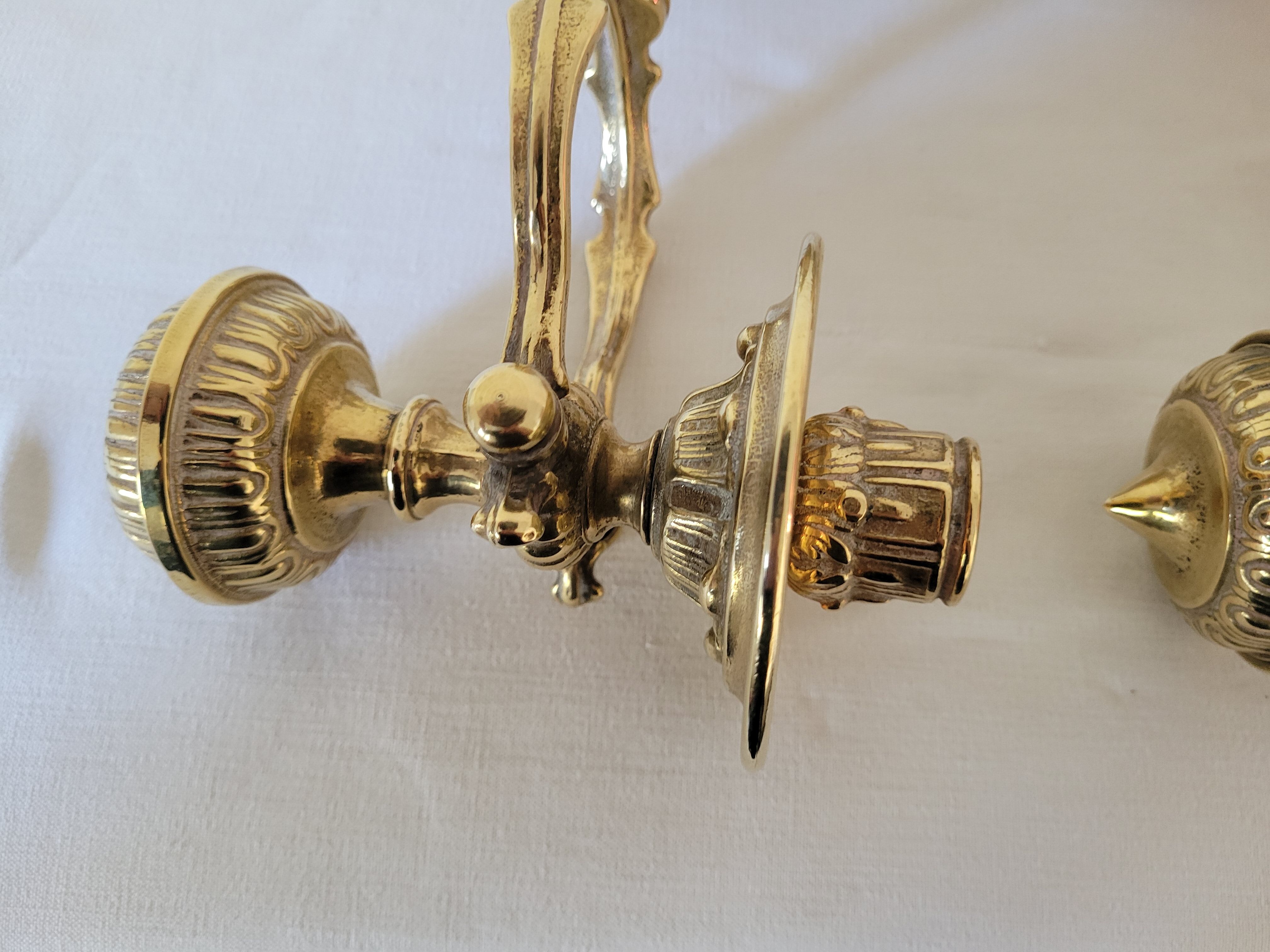 Duo of brass balance wall candle holders