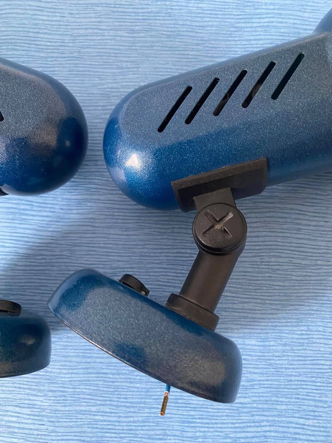 Metallic blue wall lights