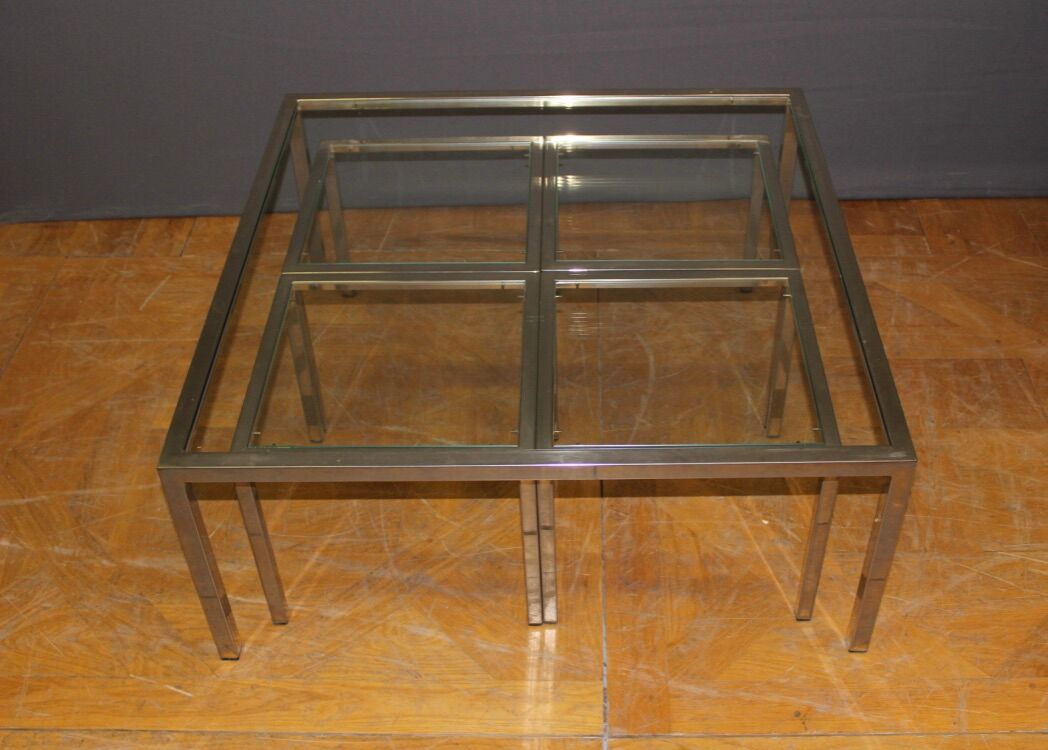 Coffee table and its steel and glass wiggles around 1970