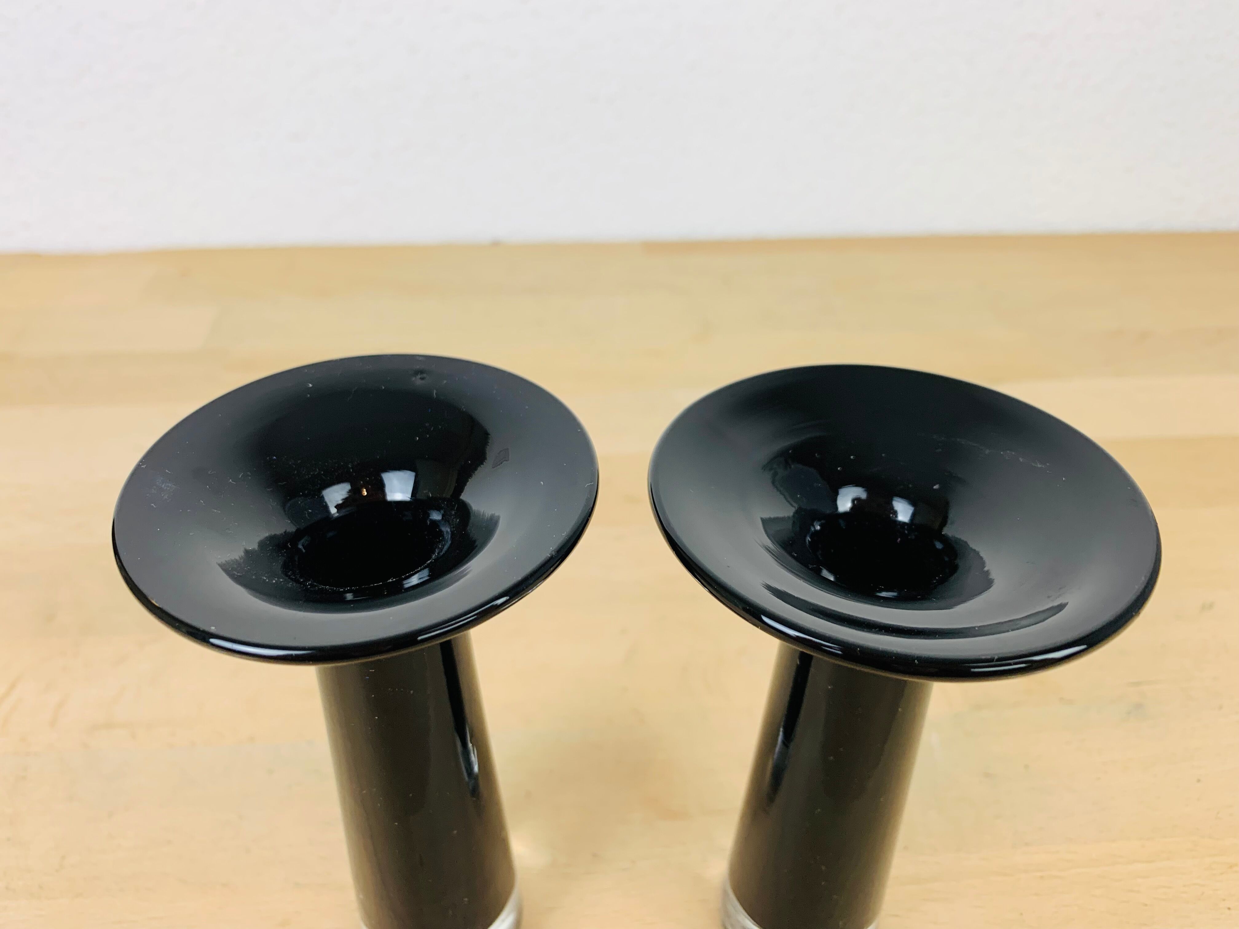 Pair of black blown glass candlesticks