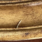 Miroir en bois doré patiné 58cm