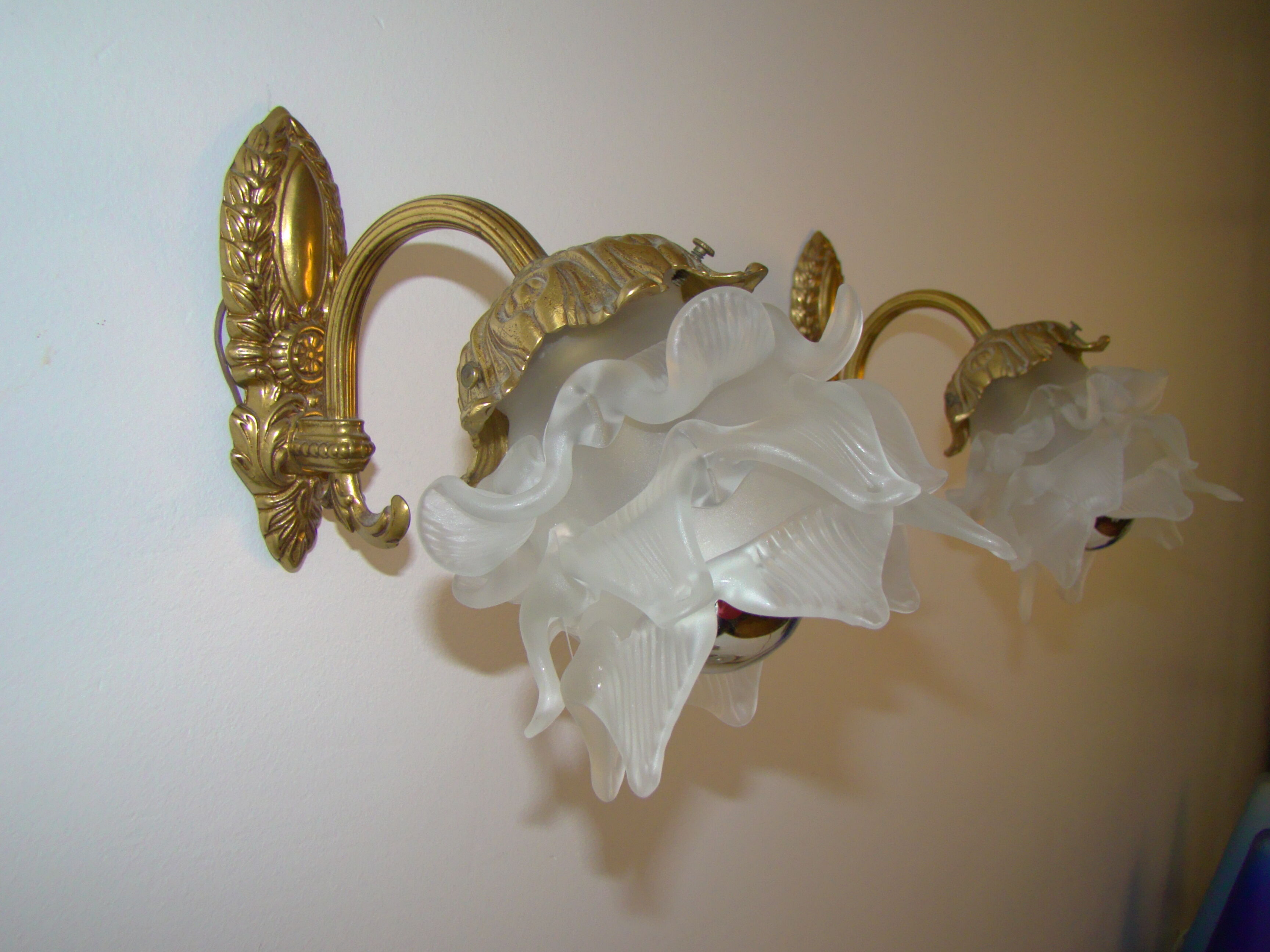 Pair of tanned sconces and glass paste