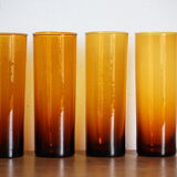 4 amber glasses with orangeade