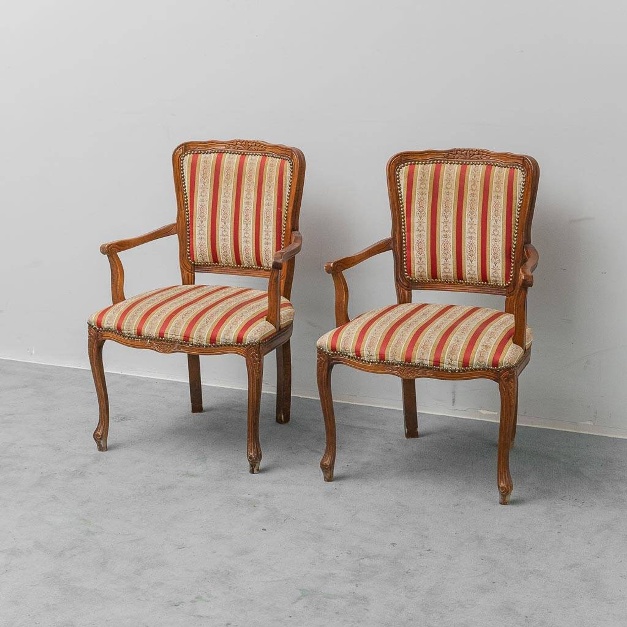 Pair of Parisian-style armchairs in wood with striped fabric armrests, vintage