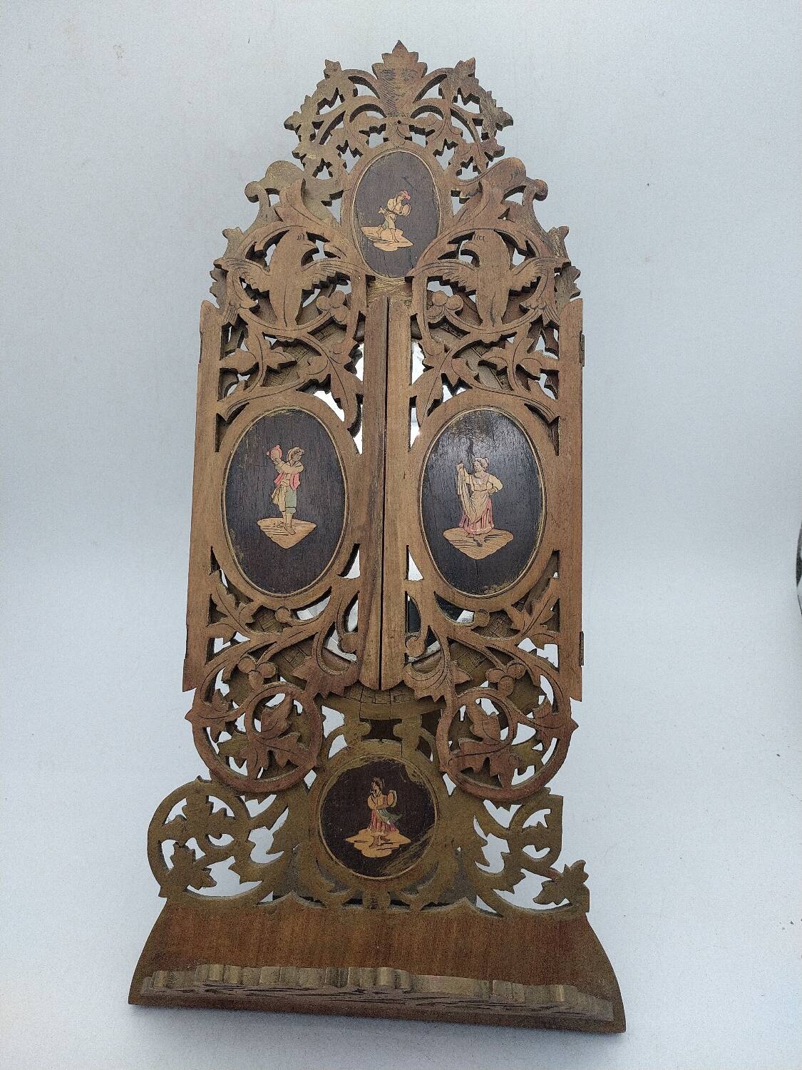 Ancient triptych in olive wood. Italy.