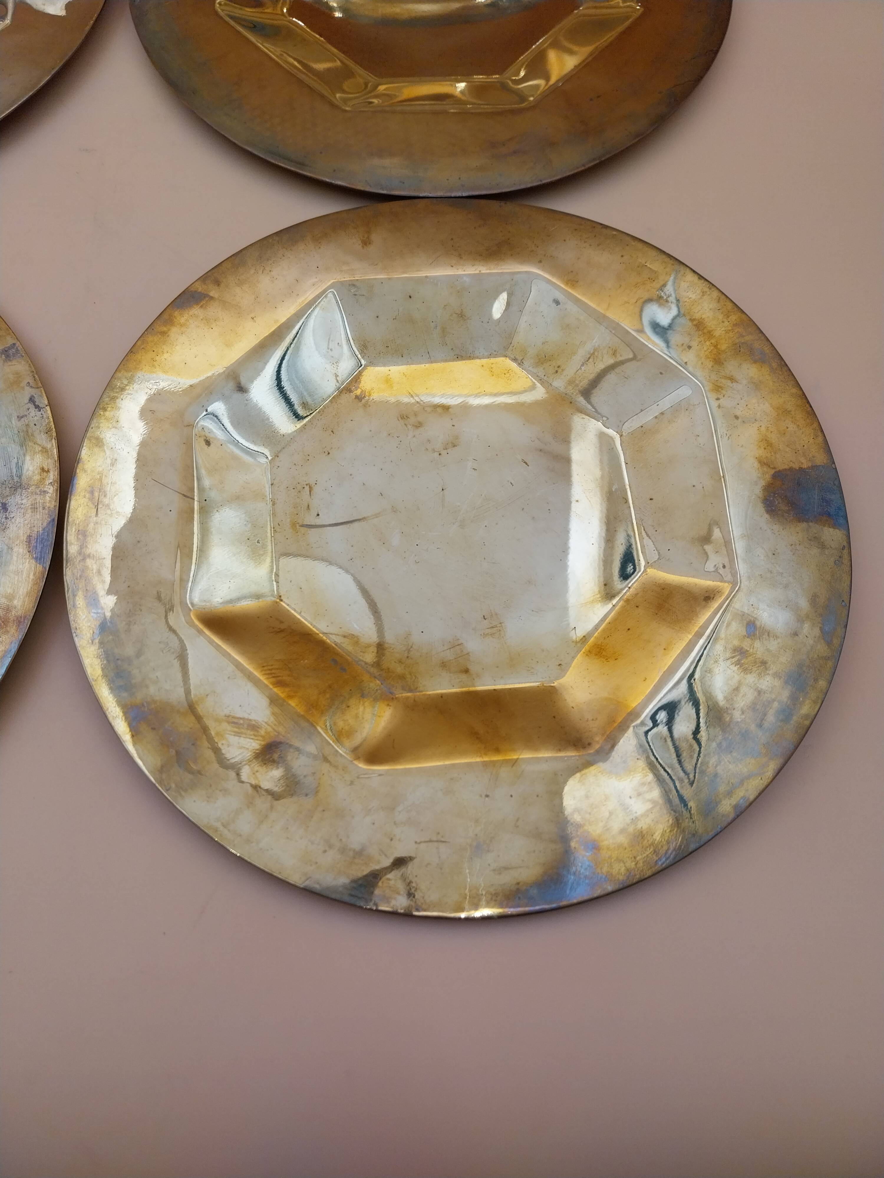 6 brass plates under plates