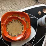 Dish and 4 plates in glazed stoneware orange color and pattern