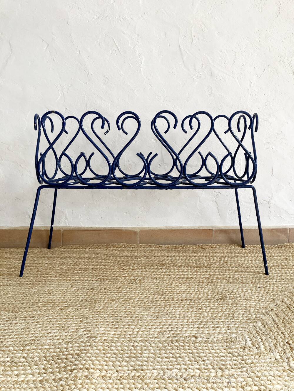 Pair of blue-painted wrought iron planters, 1960s
