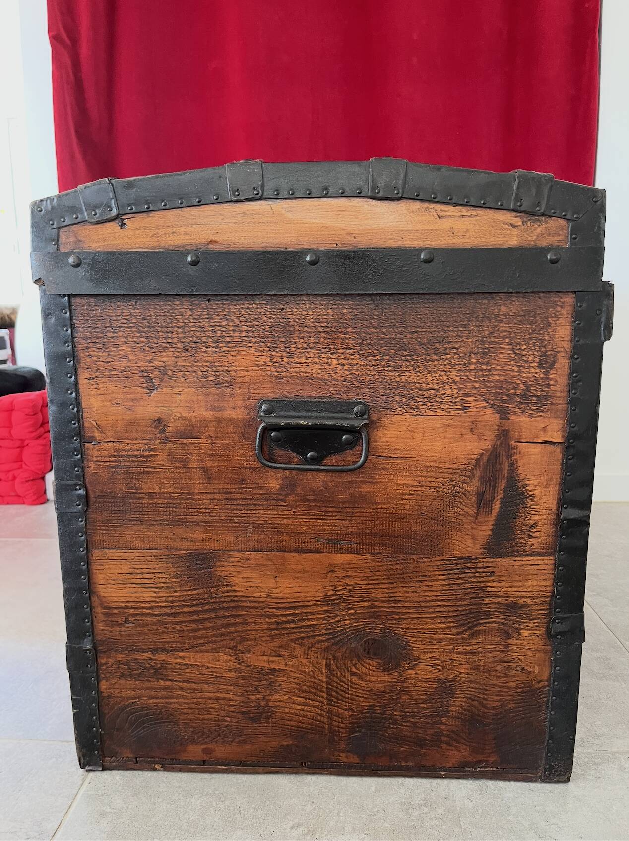 Curved wooden transport trunk from the late 19th to early 20th century.