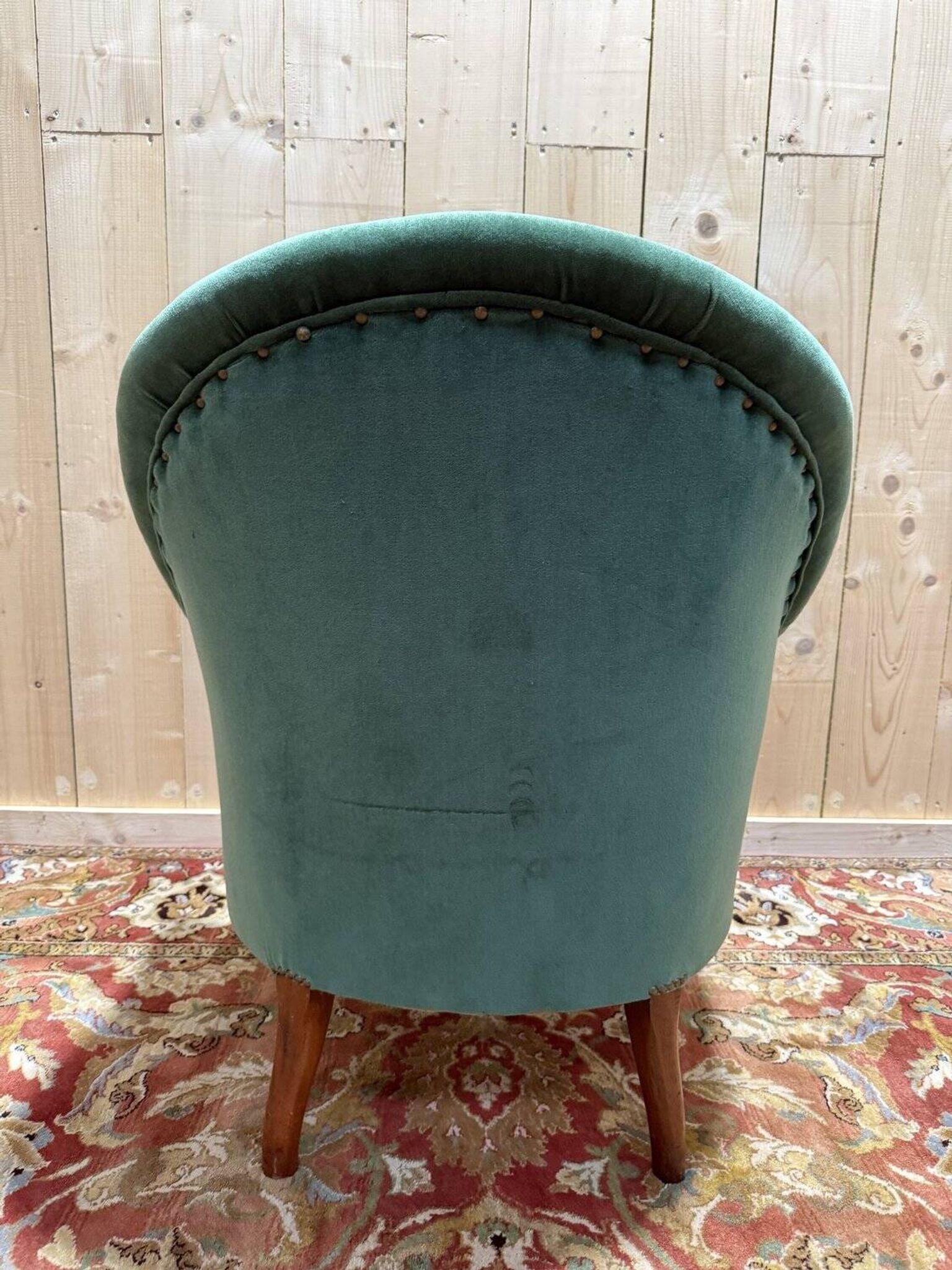 Napoleon III period crapaud armchair in green velvet.
