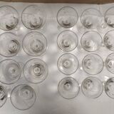 set of 23 champagne glasses or wine glasses in chiseled crystal.