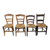 4 mismatched wood and straw chairs