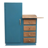 Asymmetrical changing table cabinet