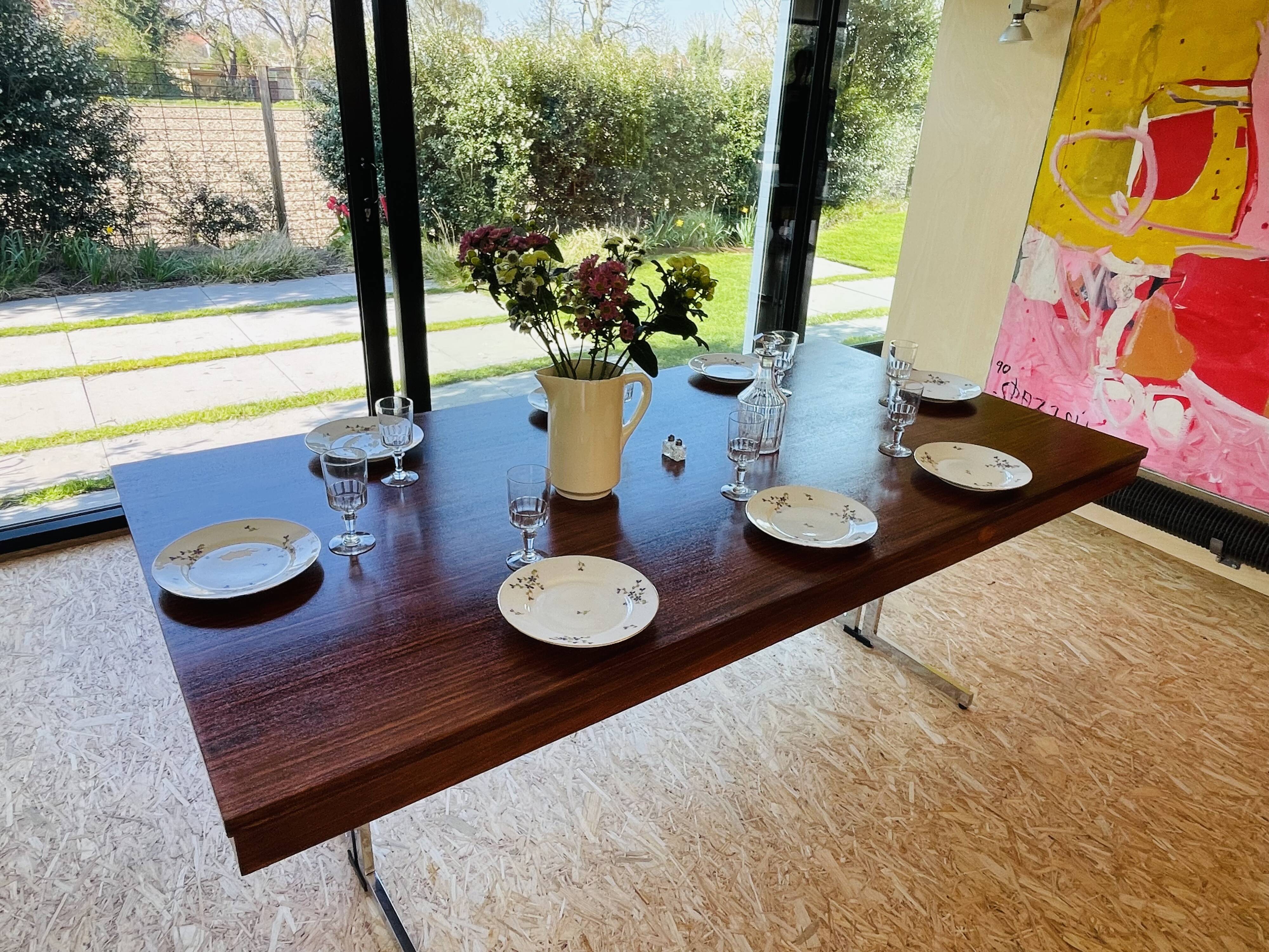 Desk that can serve as a dining table.