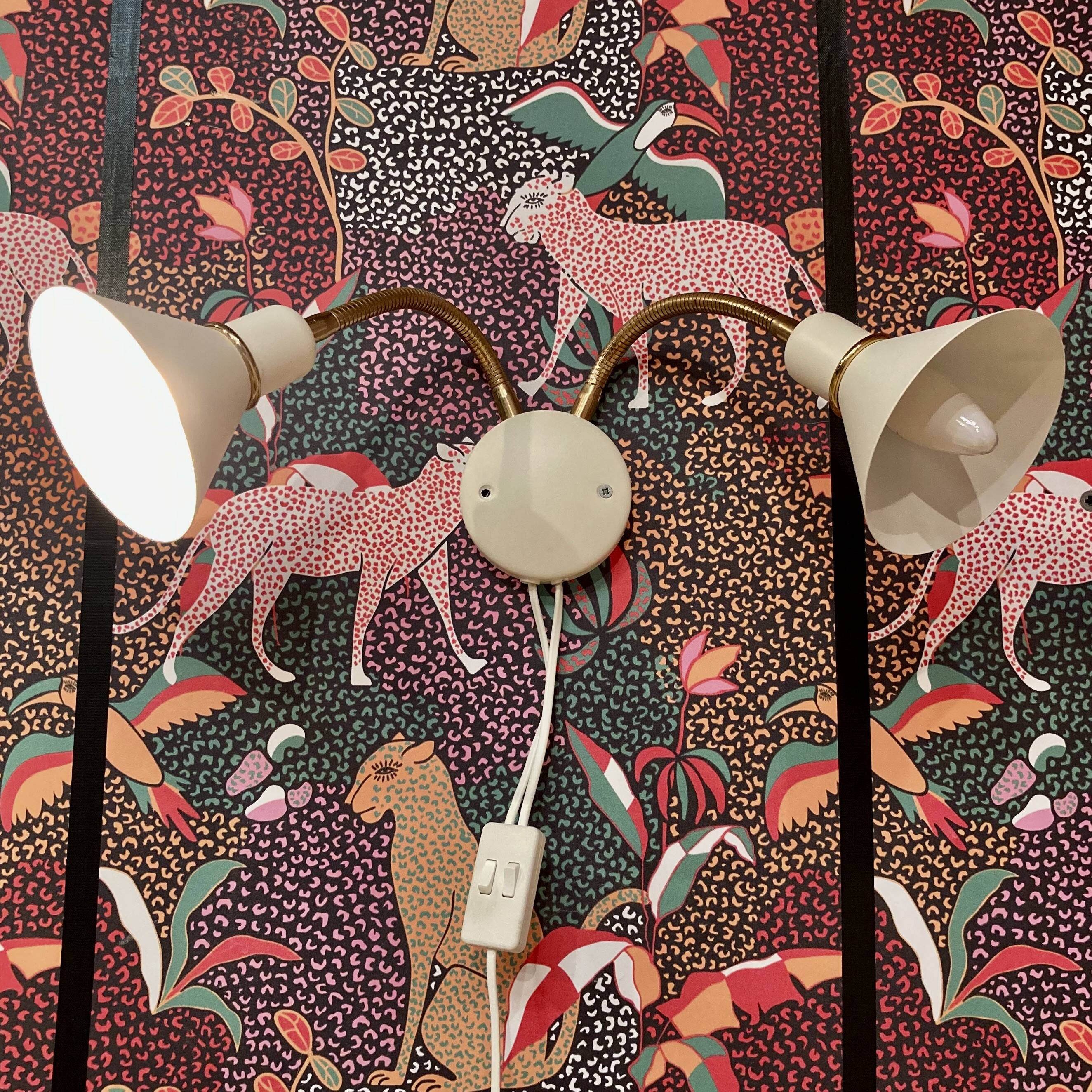 Double adjustable wall lamp Scandinavian design.