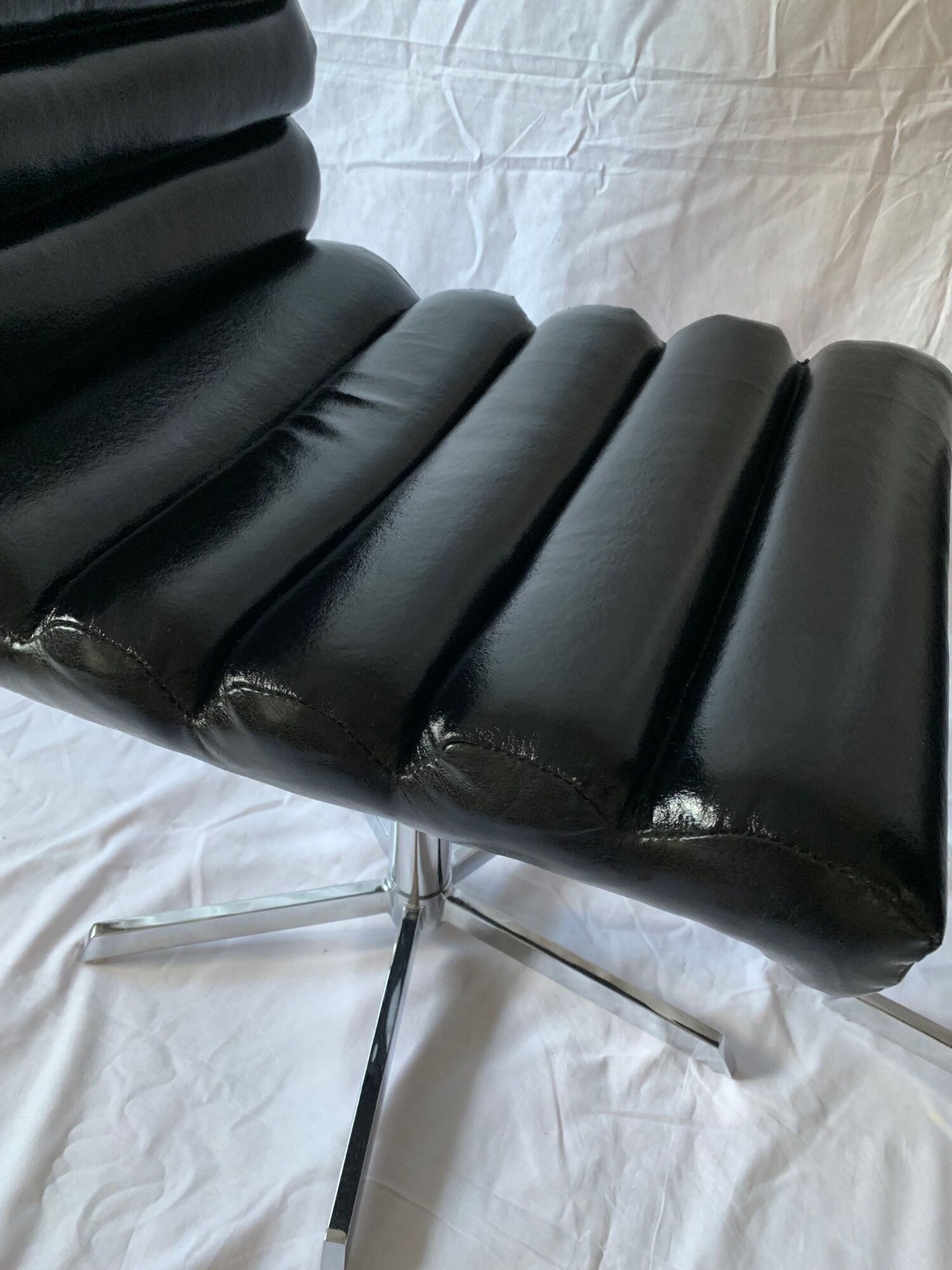 A set of four leather chairs, Italy, 80s