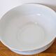 White porcelain soup tureen from Limoges with a vegetal scroll design.
