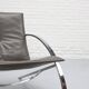 Fauteuil lounge Arco de Paul Tuttle à Strässle