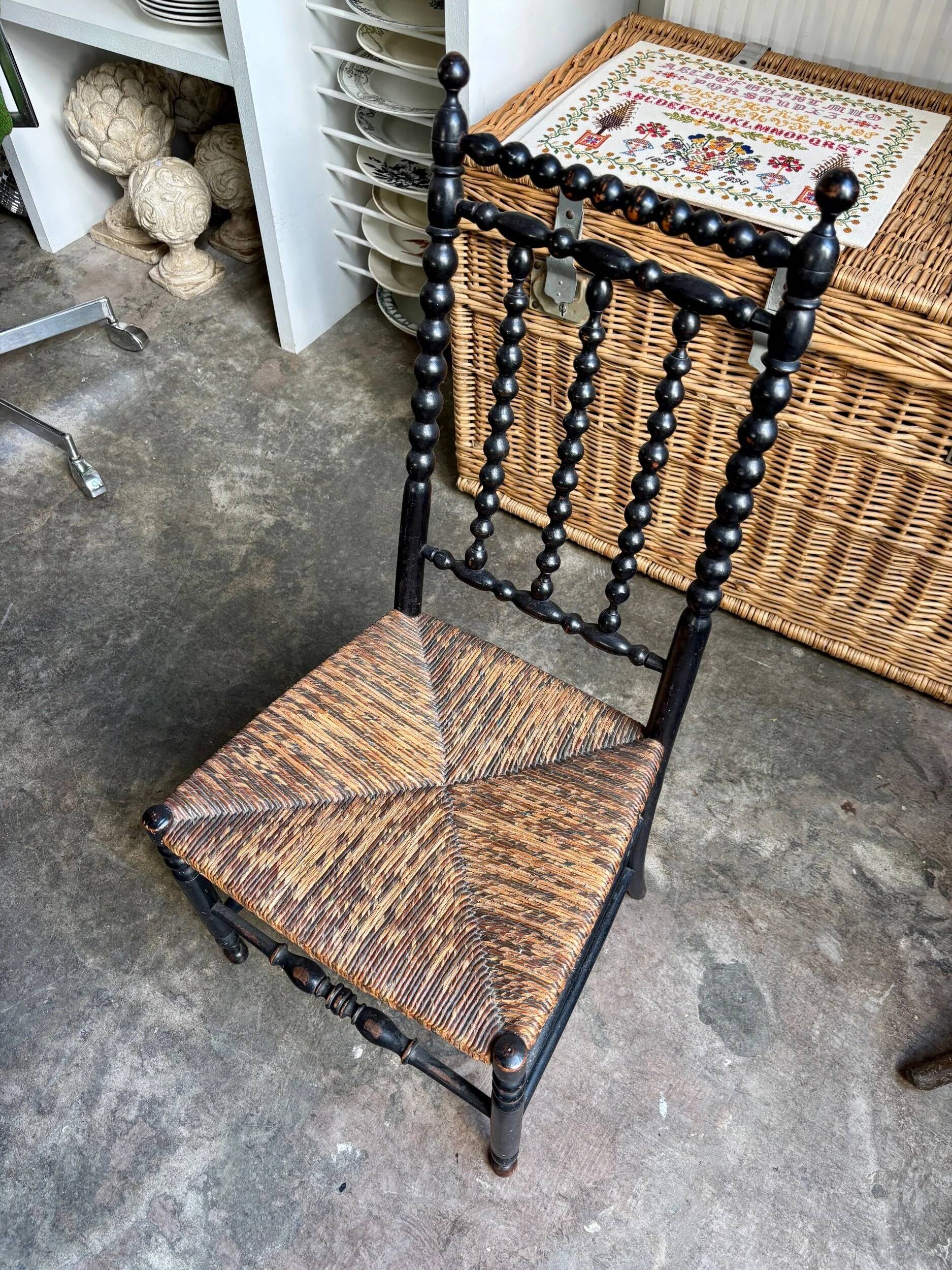 Low chair, Napoléon III child in blackened wood and woven straw.