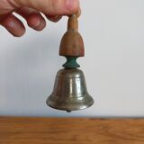 Vintage metal bell and wooden handle