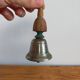 Vintage metal bell and wooden handle