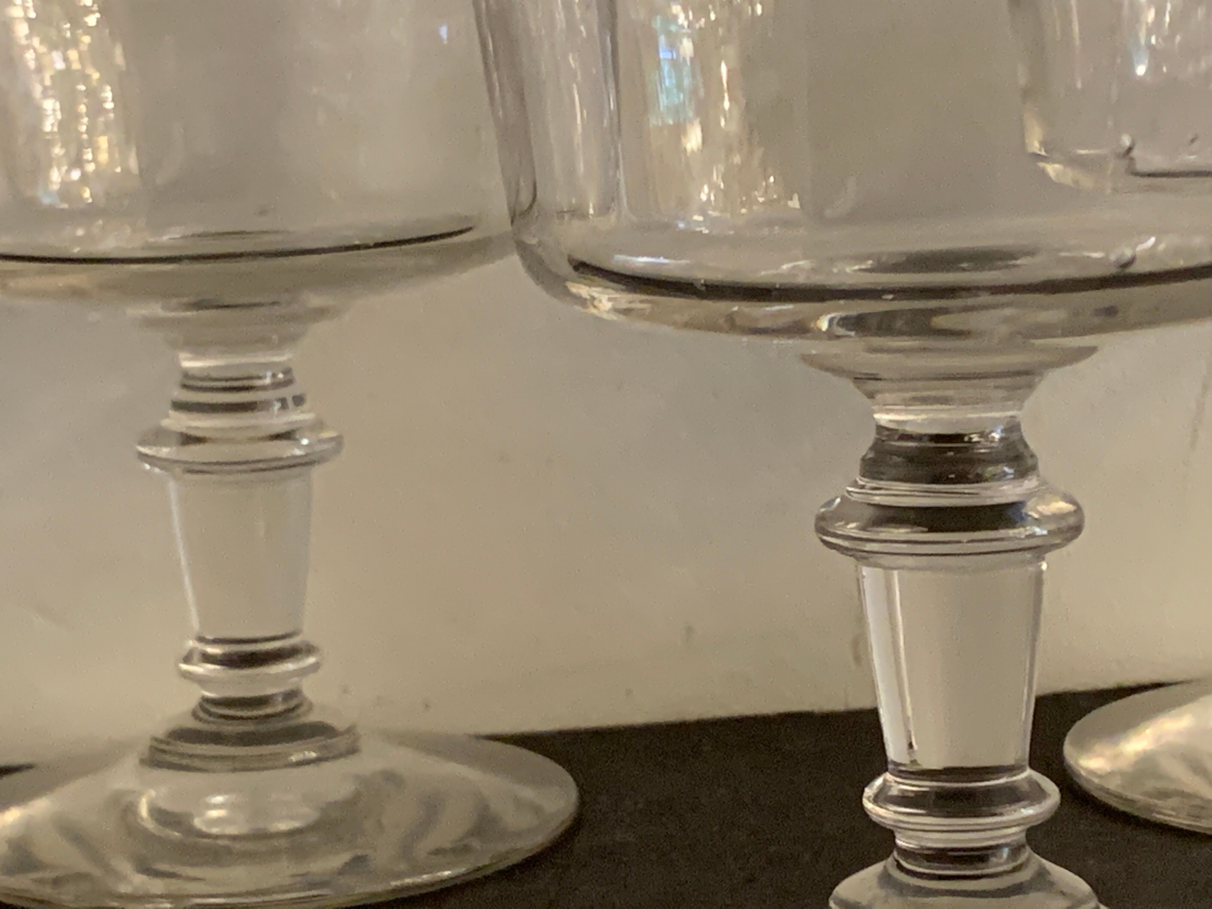 3 old champagne cups in blown and bubbled glass