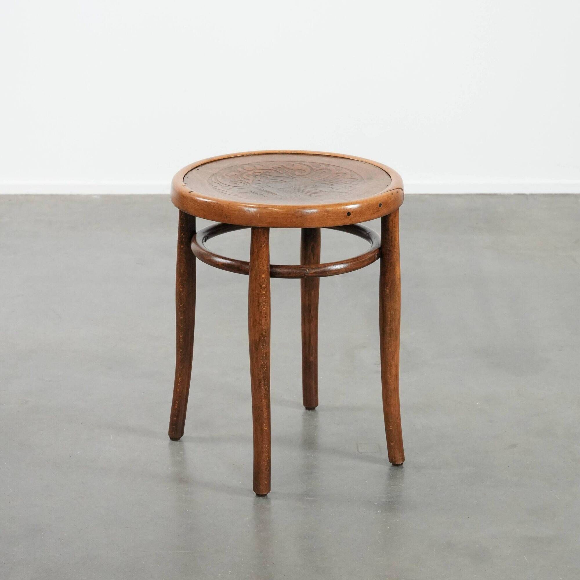Antique bentwood stool from early 1900s with a seat with beautiful details