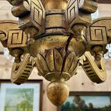 Golden wooden chandelier with crystal pendants from the 19th century.