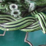 Antique woven basket in green glazed ceramic, fish decoration