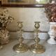 pair of openwork gilded brass candlesticks from the 19th century