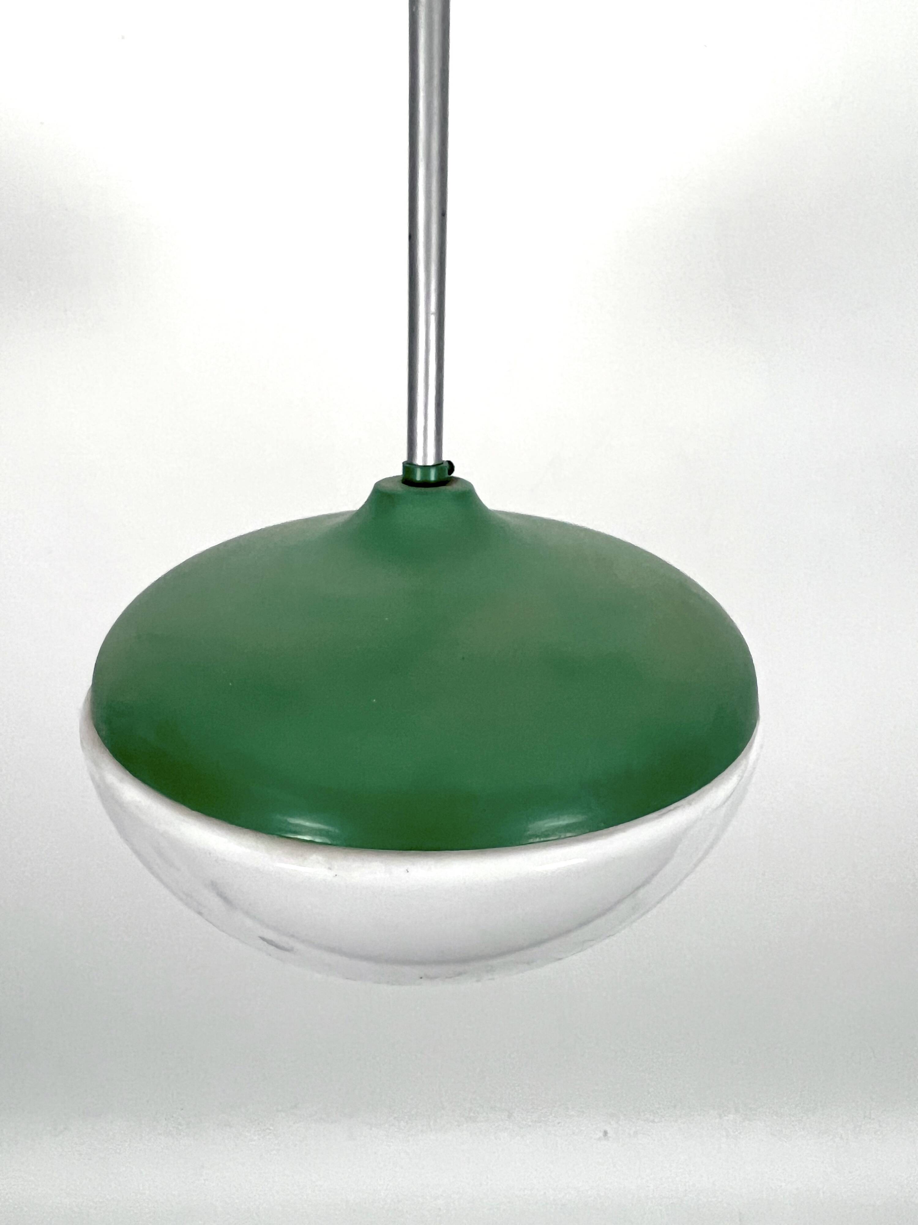 Mid-Century green lacquer and milk glass pendant. Italy 1950s