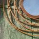 Round rattan mirror