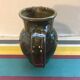 Former green enamelled sandstone pitcher